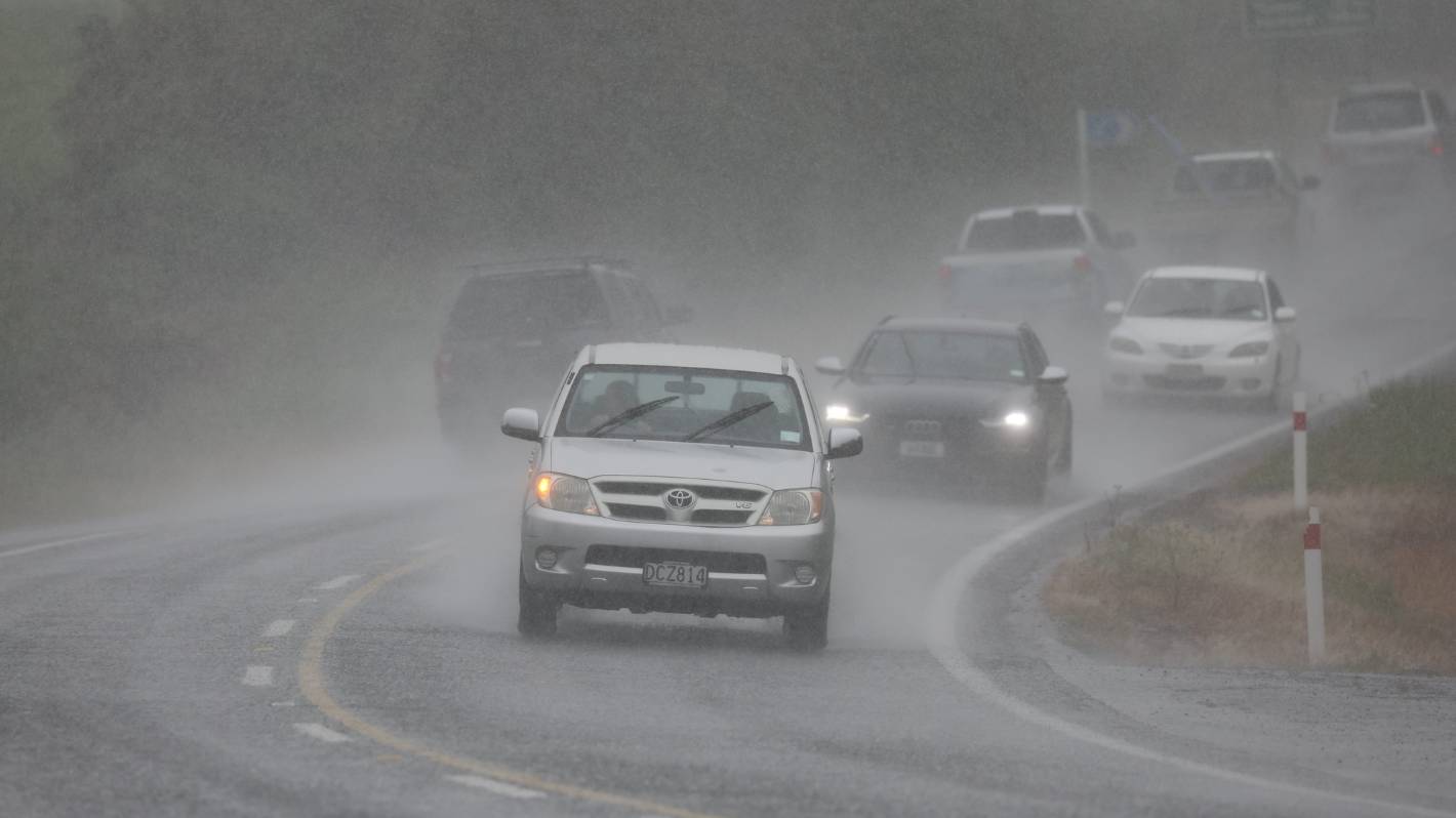 Roads flooded, swells expected as rain lashes North Island