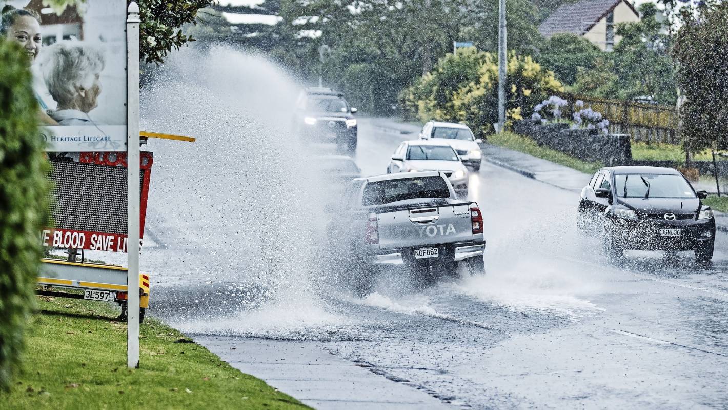 Flash flooding shuts motorway off-ramp as Boxing Day deluge hits Auckland
