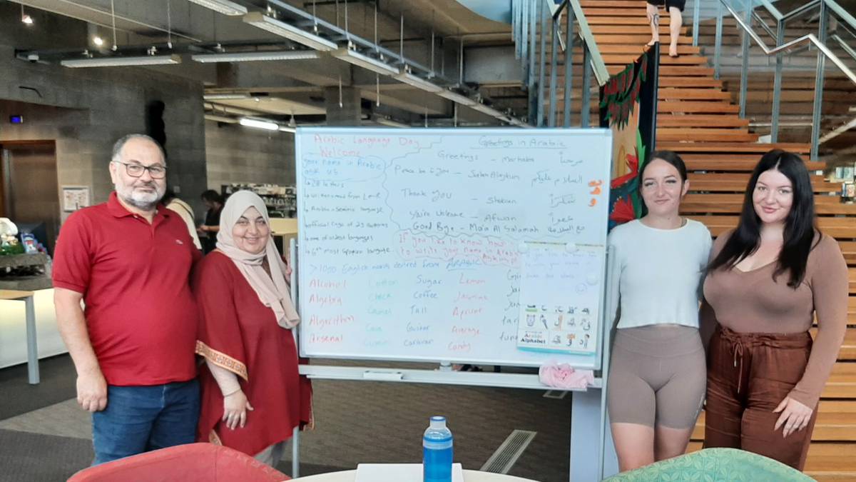 Whangārei library-goers write their names in Arabic for language week