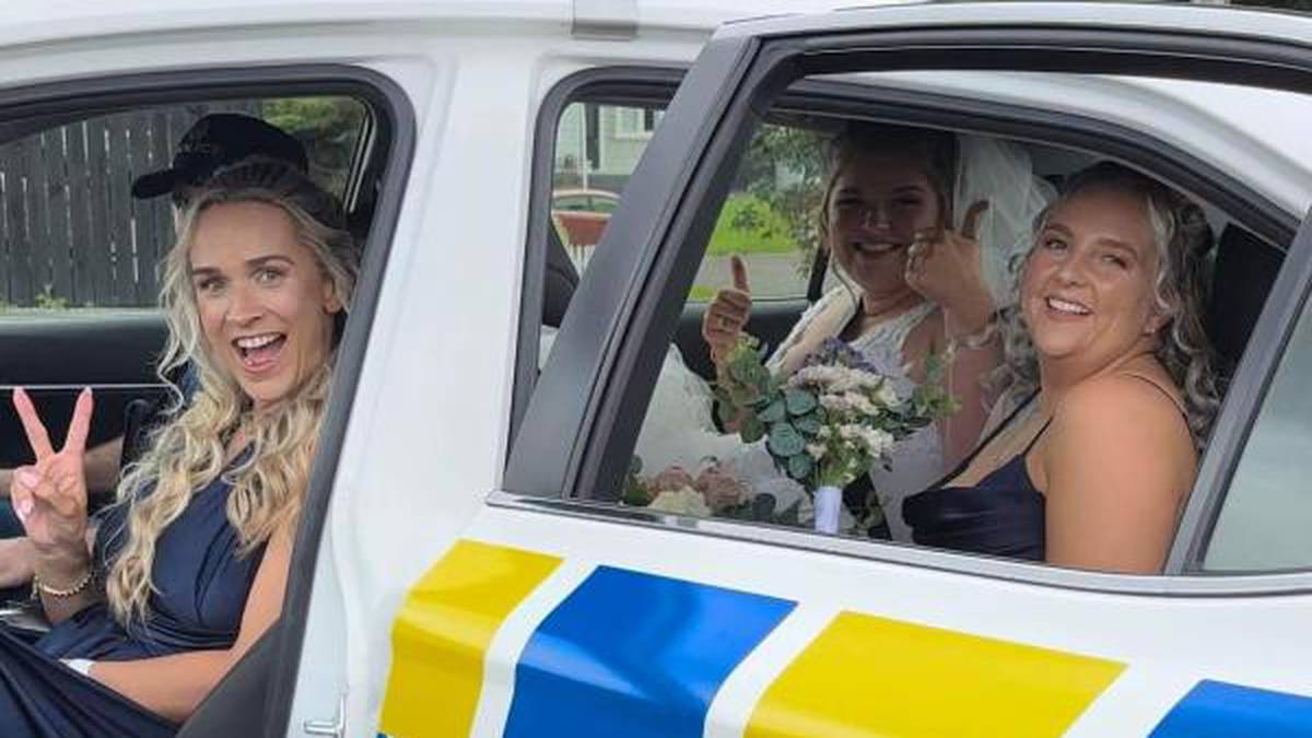 Broken down bride hitches ride with Northland police