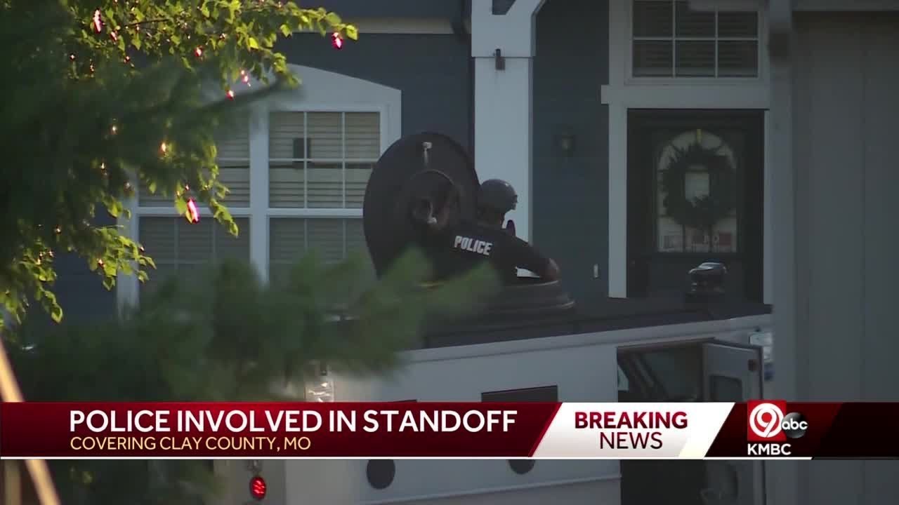 Kansas City police surround Northland home after report of person armed with a weapon